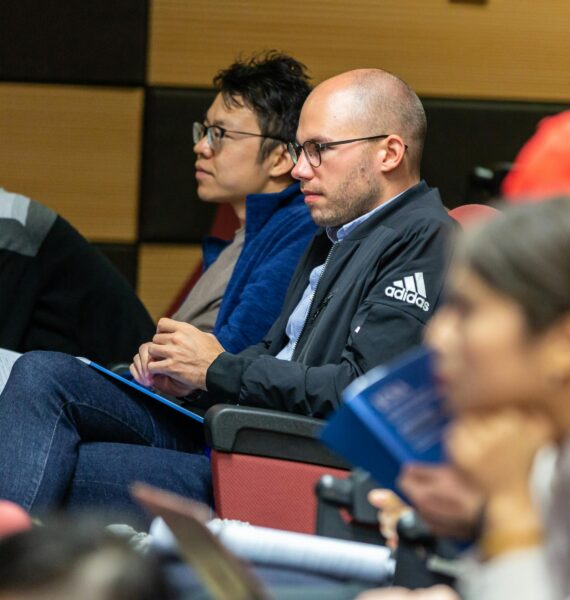 Audience listening to presentation