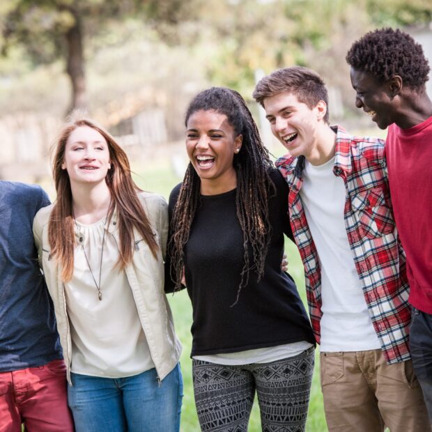 Diverse group of friends smiling together