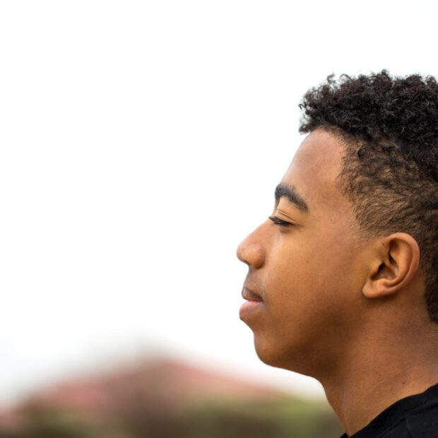 Young African American Teenager in deep thought.