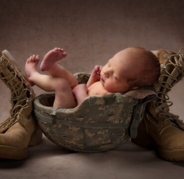 Child in Military Helmet