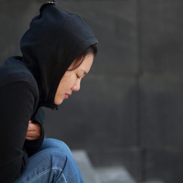 Lonely woman sitting on the stairs