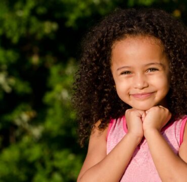 Outdoor portrait of mixed race girl
