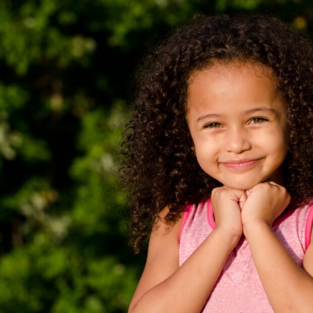 Outdoor portrait of mixed race girl