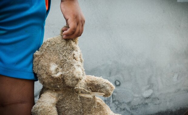 Homeless Youth with Teddy Bear